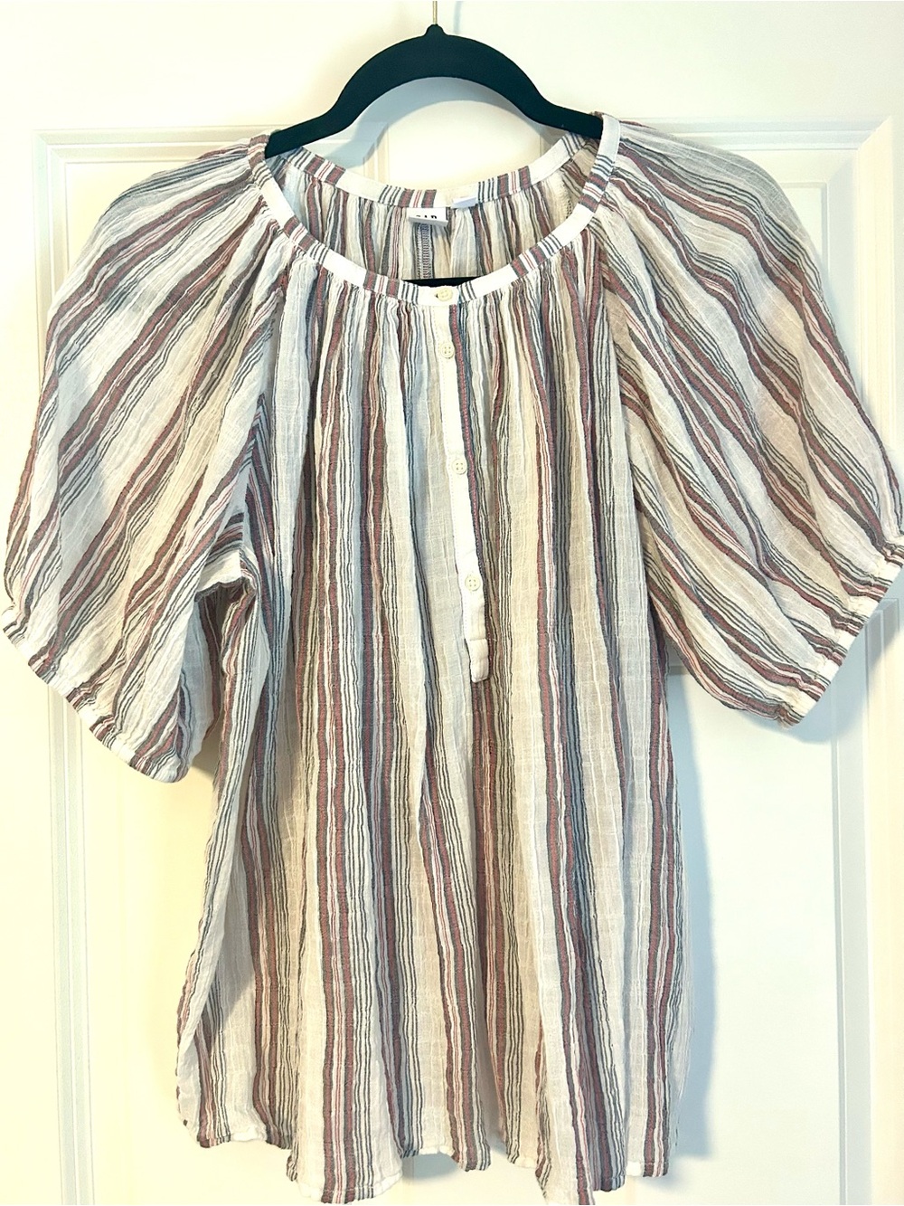 Gap top size medium with red and light gray stripe. Short sleeve with buttons.